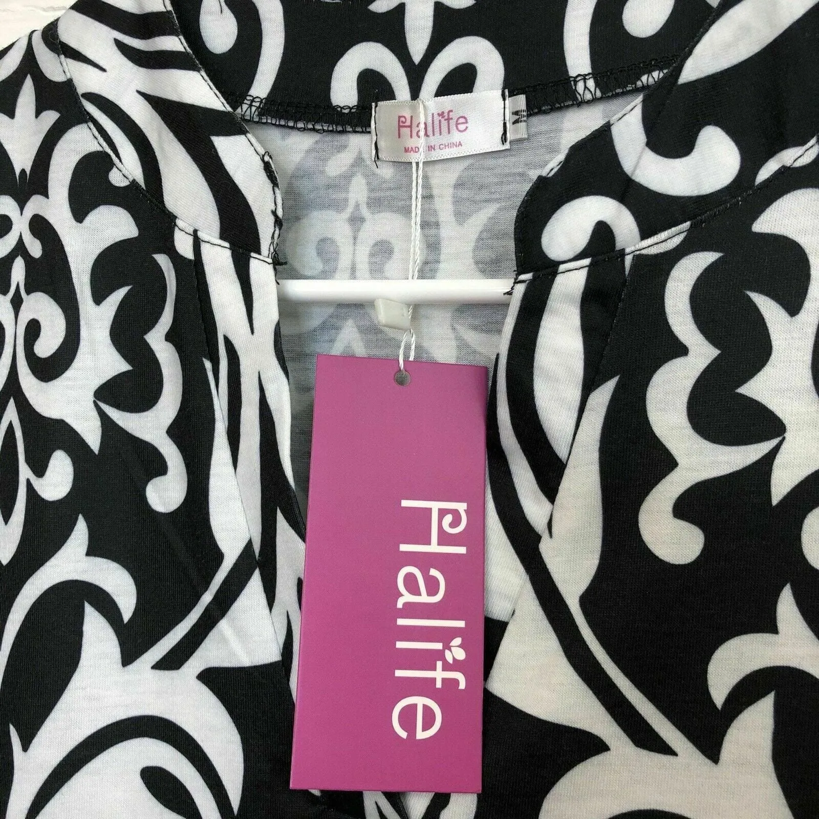 Elegant Halife Womens Floral V Neck Sleeveless Shirt - Size M, White/Black